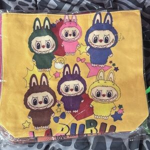 NEW Tote Bags (Labubu designs) with zipper and small zipper pocket interior.